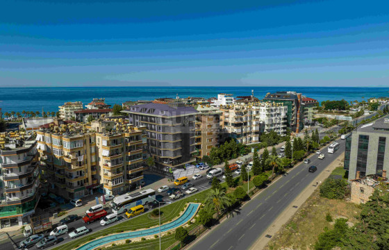 Инвестиционный проект в 200 метрах от пляжа Клеопатры, 74-156 м2. в Турции - фото 5