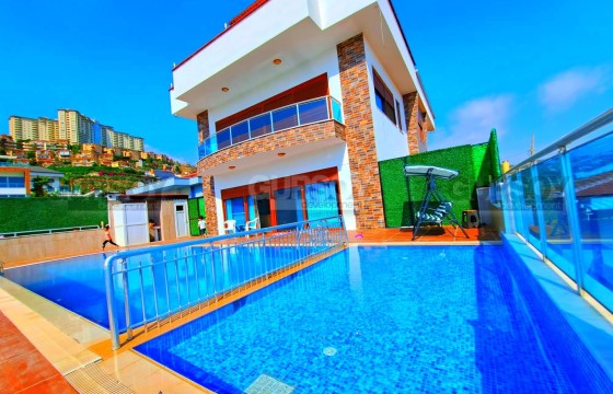 Роскошная меблированная вилла 11+1 с инфраструктурой в Каргыджаке, 450 м2 в Турции - фото 4