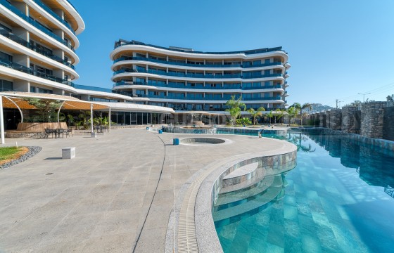 Новая меблированная квартира 1+1 в шикарном комплексе на первой линии в Каргыджаке, 45 м2 в Турции - фото 4