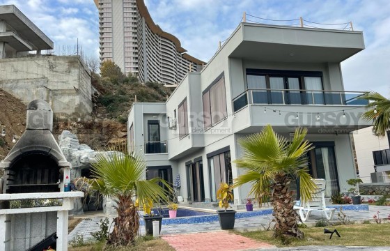 Современная вилла с бассейном и садом в Каргыджаке. 4+1,220м2 в Турции - фото 5