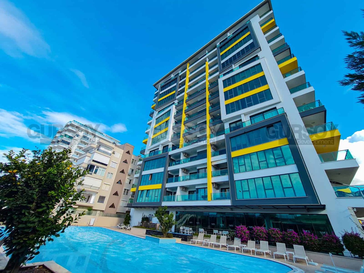 Шикарная квартира 1+1 в элитном комплексе на первой линии в Махмутларе, 65 м2 в Турции - фото 1