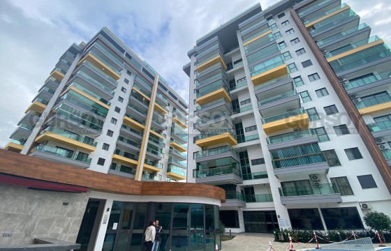 Стильная меблированная квартира 2+1 с видом на море на первой линии в  Махмутларе, 100 м2 в Турции - фото 2