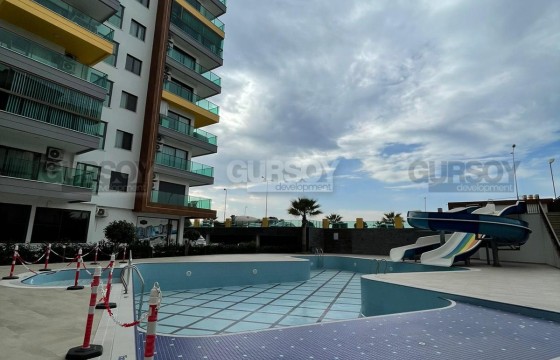 Квартира 2+1 с видом на море в шикарном жилом комплексе на первой линии в Махмутларе, 100 м2 в Турции - фото 5