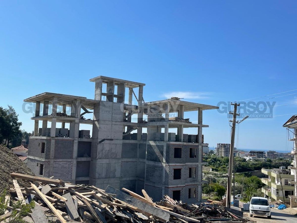 Комплекс на этапе стройки в районе Авсаллар. Демократичные цены на квартиры 1+1 и 2+1 (47-83м2) в Турции - фото 1