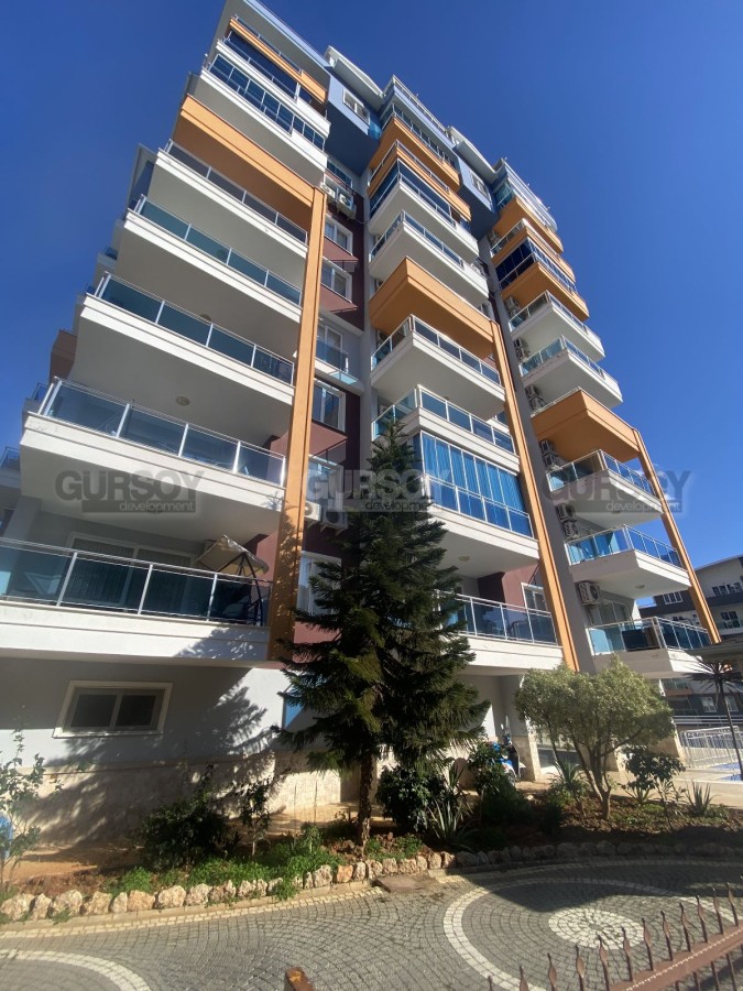 Просторная меблированная квартира 1+1 в районе Тосмур,75м2 в Турции - фото 1