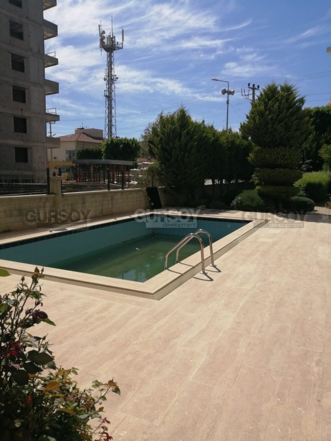 Просторная квартира 1+1 в комплексе с бассейном в центре Авсаллара, 75 м2 в Турции - фото 1