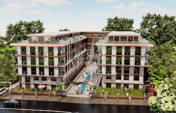 Строящийся стильный комплекс в районе Бейликдюзю, 77м2-217м2 в Турции - фото 1