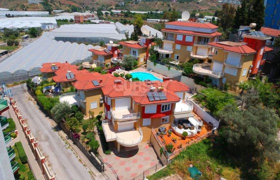 Меблированная квартира 3+1 с видом на море в уютном таунхаусе в Каргыджаке, 270 м2 в Турции - фото 5