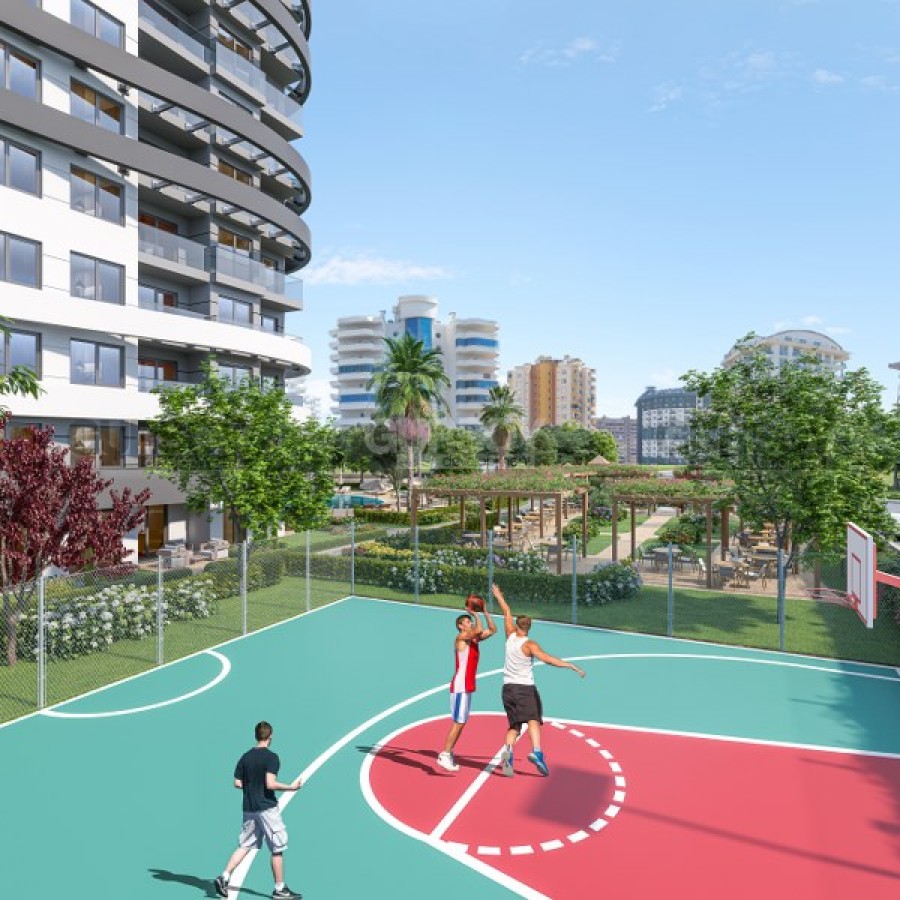 Просторные квартиры 1+1 и 2+1 в комфортабельном строящемся комплексе в Махмутларе, 64-166 м2 в Турции - фото 1