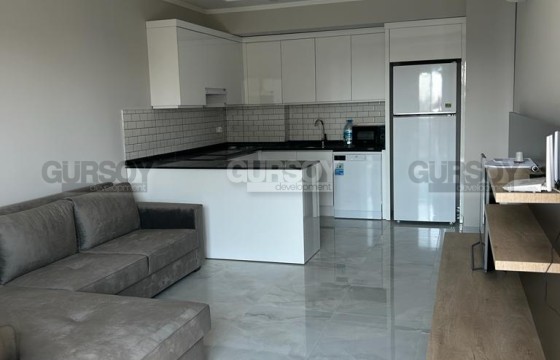 Квартира в стиле минимализма в новом комплексе  в районе Авсаллар. 1+1,66м2 в Турции - фото 5