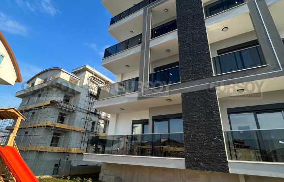 Квартира 2+1 в новом комплексе, 90 м2. Тосмур, Алания. в Турции - фото 1