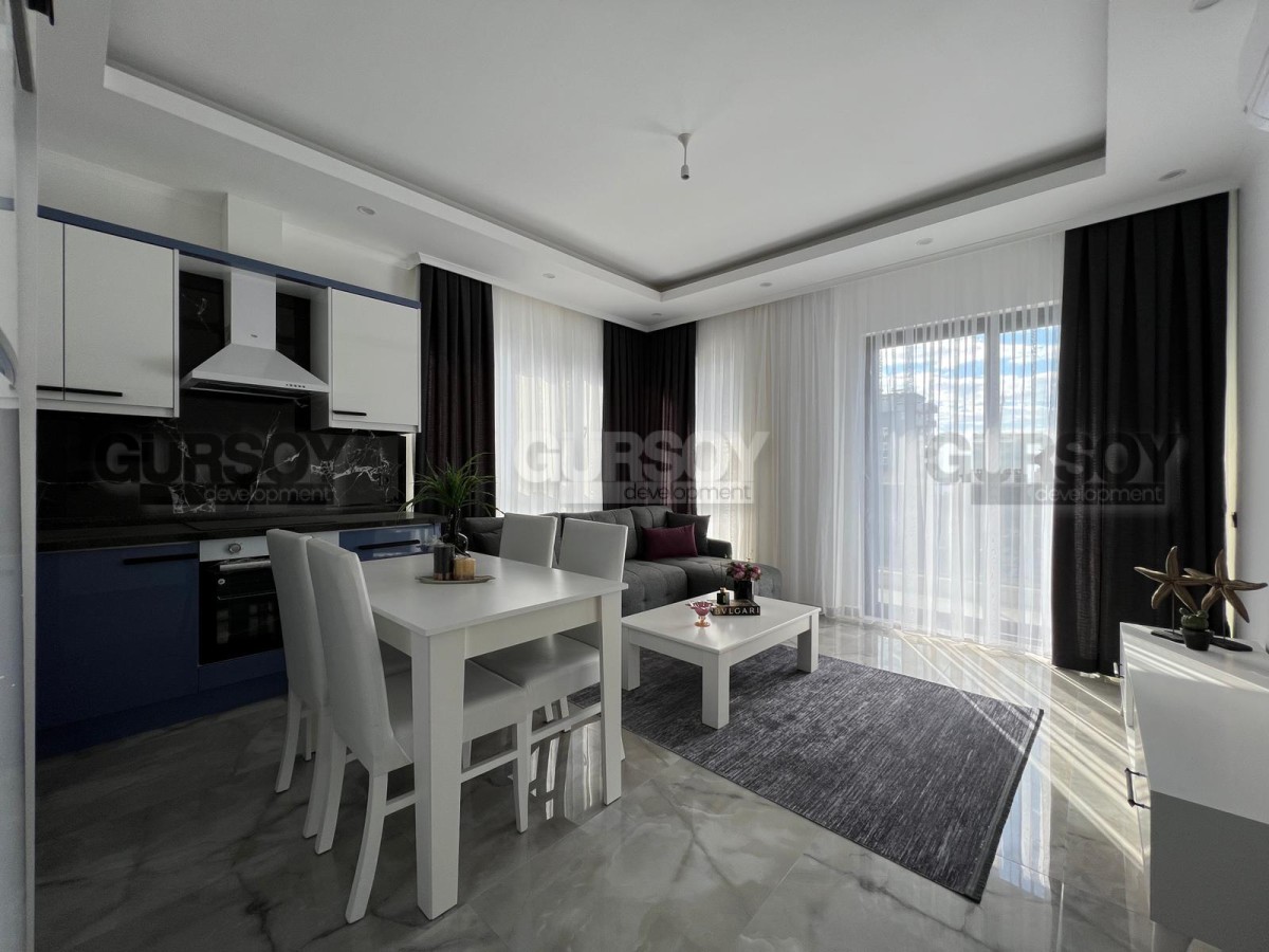 Недорогая меблированная квартира 1+1 в новом комплексе в Махмутларе, 45м2 в Турции - фото 1