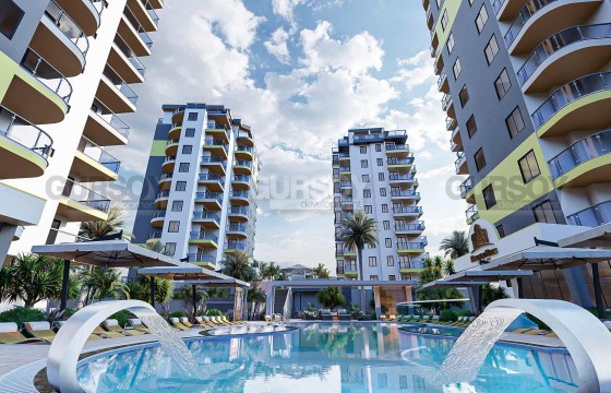 Новые квартиры 1+1 и 2+1 в комплексе с инфраструктурой всего в 400 м от моря в Махмутларе, 50-65 м2 в Турции - фото 2