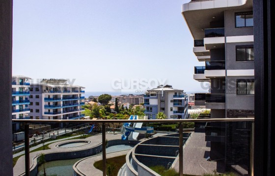 Новая квартира 1+1 с видом на море в элитном жилом комплексе в Каргыджаке, 65 м2 в Турции - фото 4