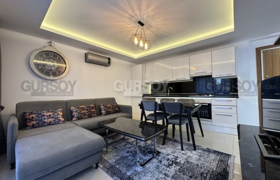 Меблированные апартаменты в районе Клеопатра 1+1, 55м2 в Турции - фото 4