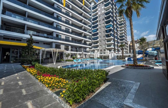 Стильная квартира 1+1 в шикарном жилом комплексе в Махмутларе, 65 м2 в Турции - фото 4