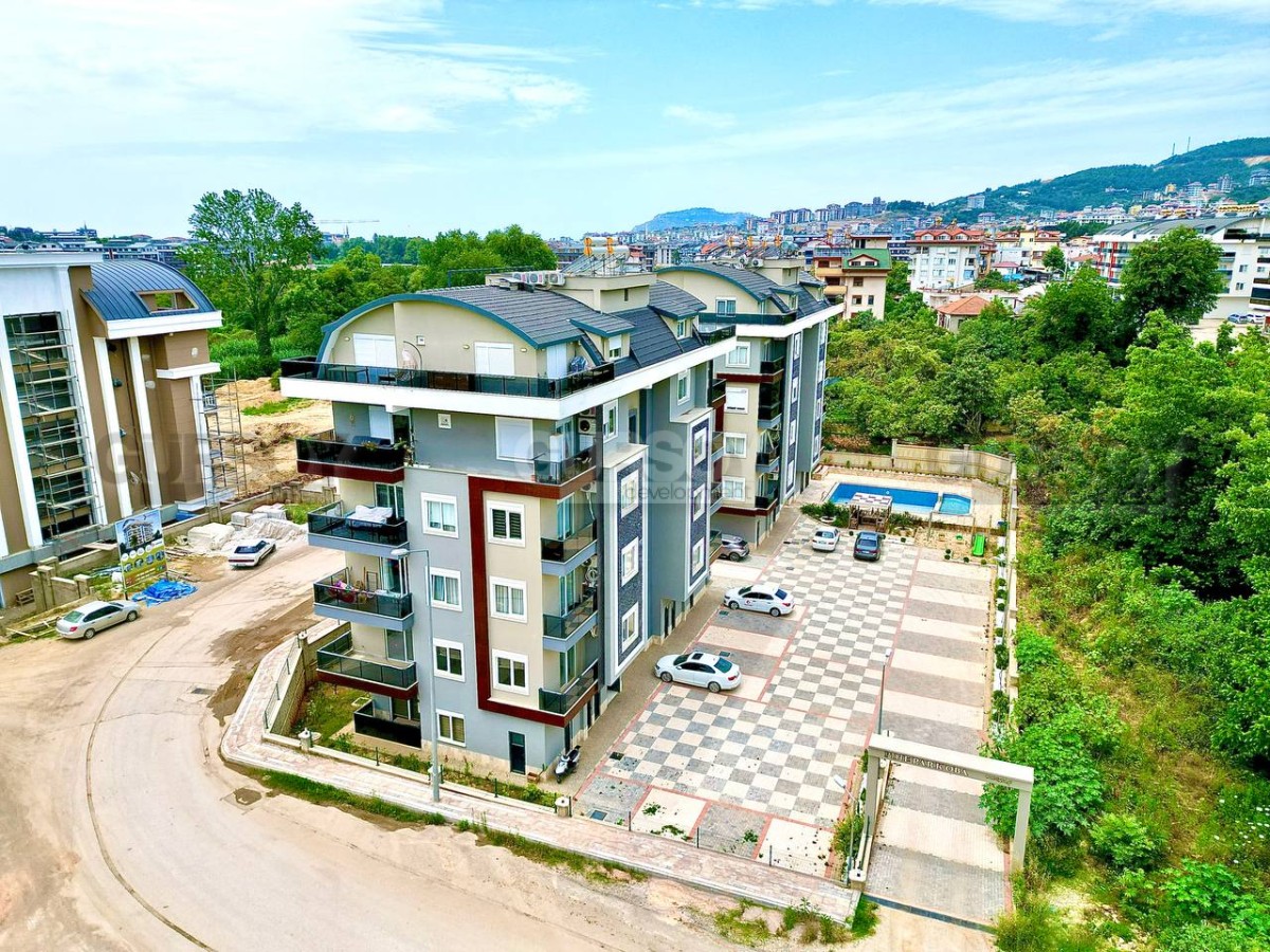 Уютная квартира 2+1 в престижном районе Оба в Турции - фото 1