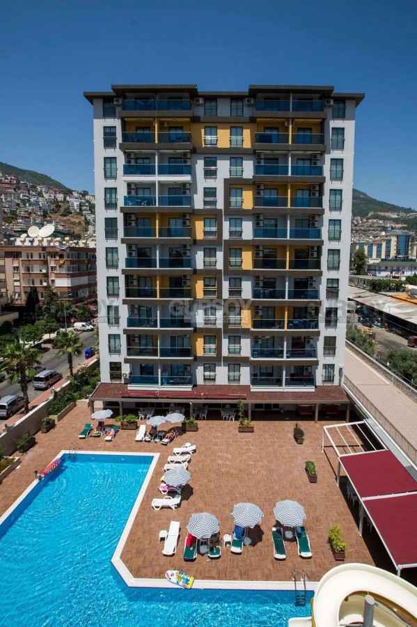 Меблированная квартира 1+1 в роскошном жилом комплексе в шаге от пляжа Клеопатры, 50 м2 в Турции - фото 1