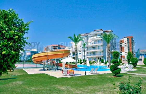 Просторная, полностью меблированная квартира 1+1 в уютном комплексе в Джикджилли, 70 м2 в Турции - фото 1