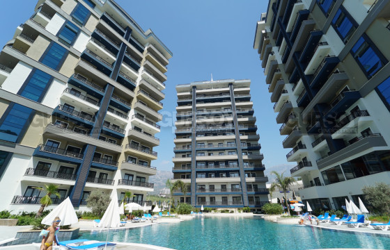 Просторный лофт 1+1 в резиденции отельного типа, 124 м2 в Махмутларе. в Турции - фото 2