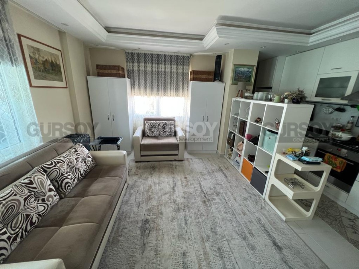 Меблированная квартира 1+1 с красивым видом на горы всего в 200 м от пляжа в районе Оба, 45 м2 в Турции - фото 1