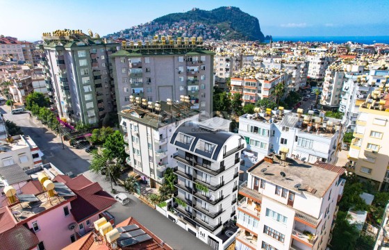 Последние квартиры 1+1 на завершающем этапе в 650 м от пляжа Клеопатры, 48-52 кв.м в Турции - фото 3