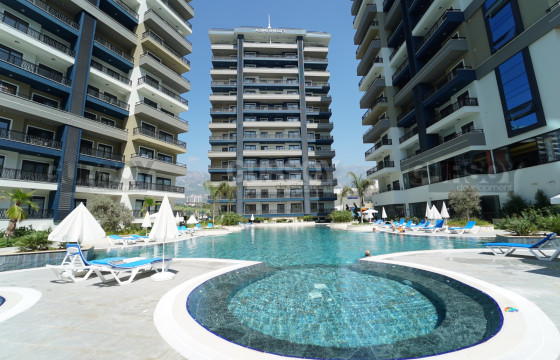 Апартаменты 1+1 в резиденции отельного типа, 50 м2 в Махмутларе. в Турции - фото 9