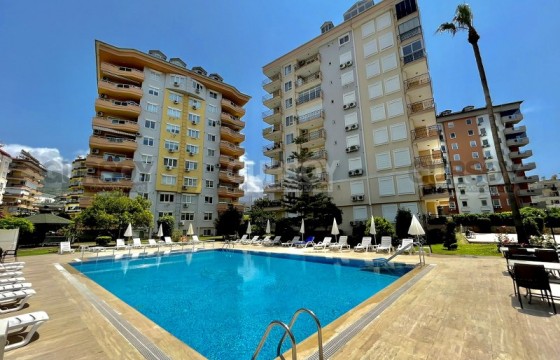 Просторная двухкомнатная квартира 60 м2 в центре Алании. в Турции - фото 2