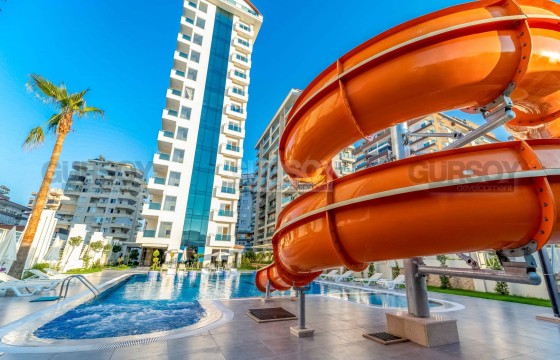 Стильная квартира 1+1 с видом на горы и море в элитном ЖК в Махмутларе, 55 м2 в Турции - фото 5