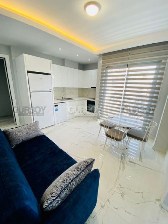 Меблированная квартира в новом комплексе с шикарной локацией в центре Алании, 45 м2 в Турции - фото 1