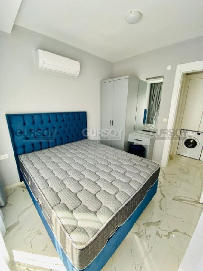 Меблированная квартира в новом комплексе с шикарной локацией в центре Алании, 45 м2 в Турции - фото 1