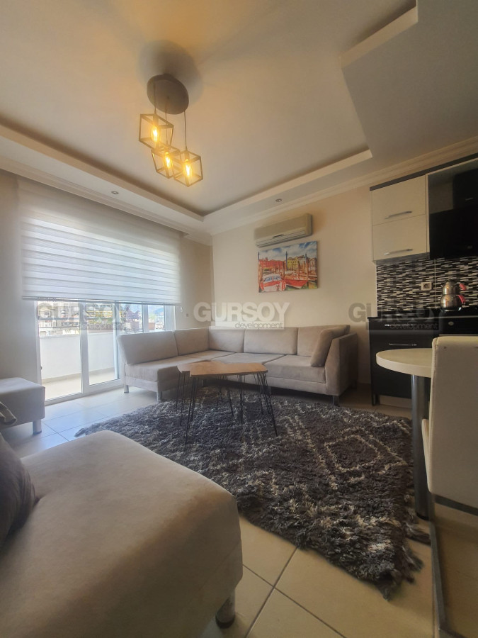 Меблированный апартаменты 1+1 в Махмутларе, 60 м2 в Турции - фото 1