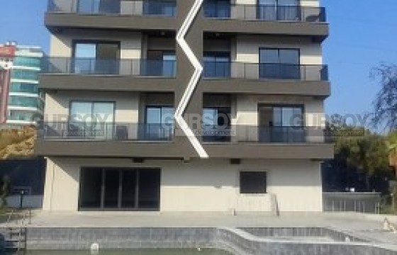 Новая квартира 1+1 с видом на море в комплексе с инфраструктурой в центре Авсаллара, 52 м2 в Турции - фото 1