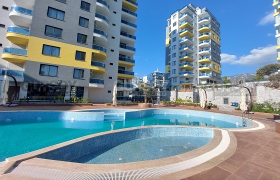 Квартиры 1+1 в новой резиденции 64-80 кв.м. в Махмутларе в Турции - фото 5