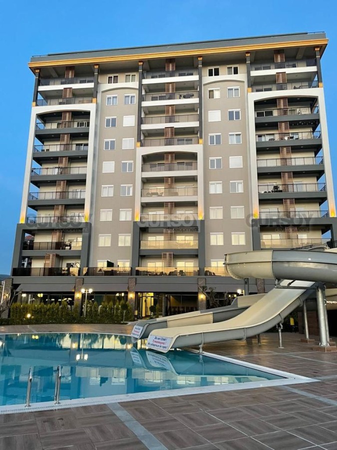 Новая квартира 1+1 роскошном жилом комплексе в Авсалларе, 55 м2 в Турции - фото 1
