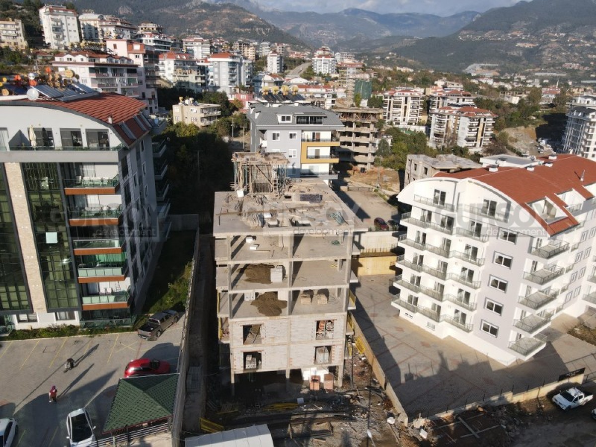Двухкомнатная квартира 57 кв.м. в районе Чиплаклы. в Турции - фото 1