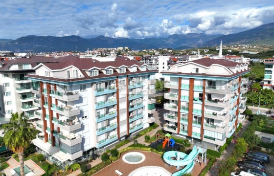 Уютная просторная квартира 1+1 всего в 50 метрах от моря в Кестеле, 65 м2 в Турции - фото 3