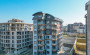 svetlye-apartamenty-11-s-vidom-na-more-v-novom-komplekse-v-raione-avsallar-54-m2 в Турции - фото 2