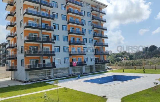 Доступная по цене, новая квартира 1+1, на площади 60 м2, в перспективном, развивающемся районе Аланьи - Авсаллар в Турции - фото 7