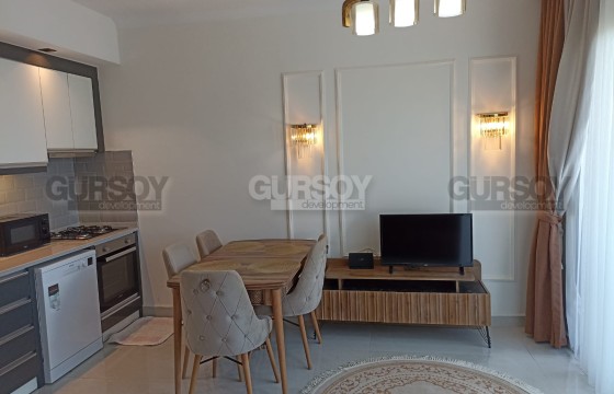 Небольшая современная квартира в 900 метрах от моря, в популярном районе Аланьи - Махмутлар в Турции - фото 2