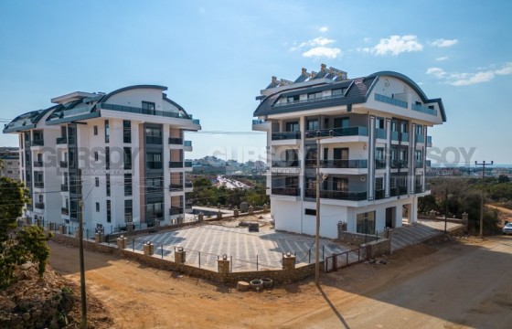 Небольшая новая квартира с чистовой отделкой, в современном жилом комплексе, в районе Нижняя Оба в Турции - фото 4