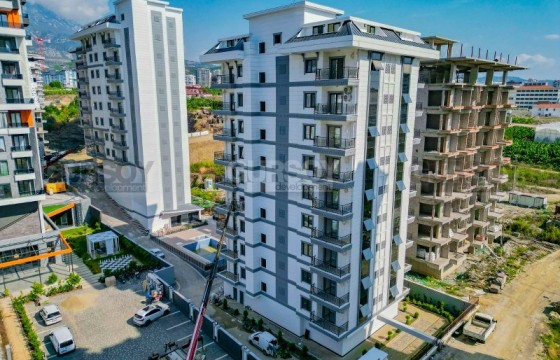 Новая квартира 1+1, на площади 58 м1+2, на 5-м этаже, в центре современного района Аланьи - Махмутлар в Турции - фото 5