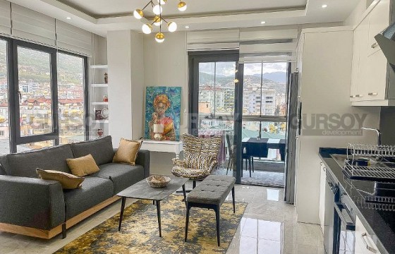 Видовая квартира 1+1, общей площадью 56 м2, в нескольких минутах ходьбы от моря, в центре Аланьи в Турции - фото 4