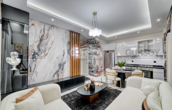 Стильная квартира с дизайнерским ремонтом, на 1-м этаже в новом жилом комплексе, введенном в эксплуатацию в 2023 году в Турции - фото 12