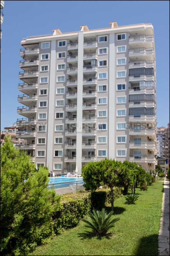 Видовая квартира с роскошной локацией на 1-й линии от моря, в центре современного района Аланьи - Махмутлар в Турции - фото 1