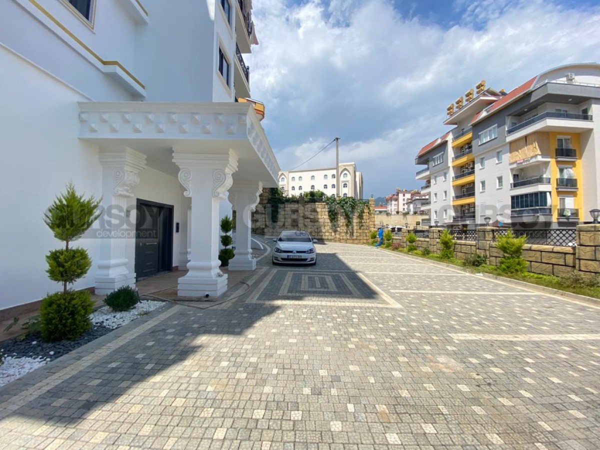 Апартаменты с качественной чистовой отделкой, в комфортабельной новой резиденции, в 800 метрах от моря в Турции - фото 1