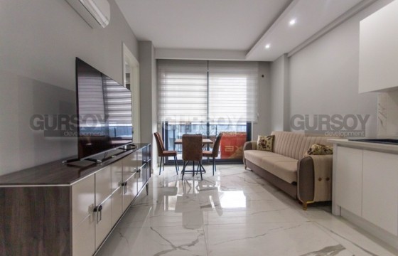 Современная, меблированная квартира 1+1, на 5-м этаже, в 550 метрах от моря в Турции - фото 4