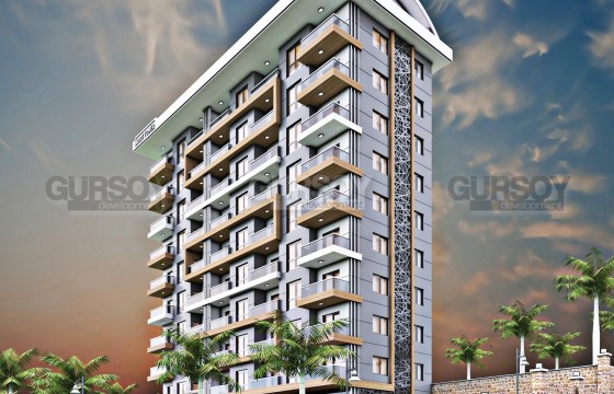 Новая квартира 1+1, на площади 65 м2, в 10-этажном жилом комплексе, в центре спокойного района Аланьи - Тосмур в Турции - фото 1