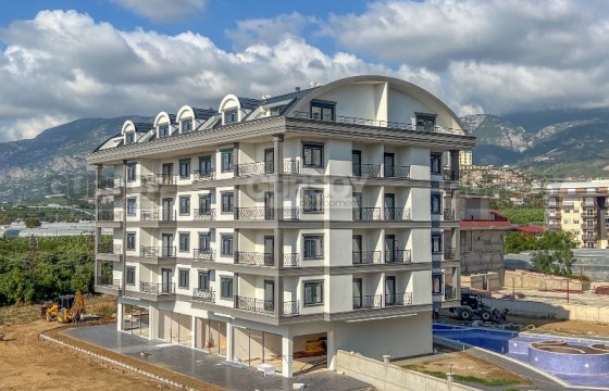 Панорамная двухуровневая квартира 2+1, в новом жилом комплексе, в центре района Каргыджак в Турции - фото 7