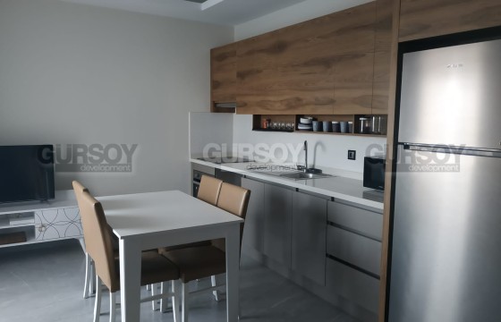 Меблированная квартира на 1-м этаже в доме 2022 года постройки, в 600 метрах от моря, в современном районе Аланьи - Махмутлар в Турции - фото 4